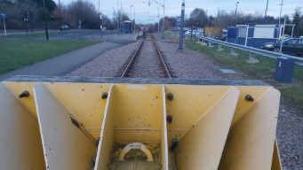 Halfway tram stop,
                    visible over the buffers at the end of the line.