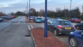 Cars in the car park.
