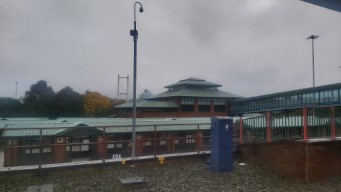 A bus station, and a bridge to the ticket office.