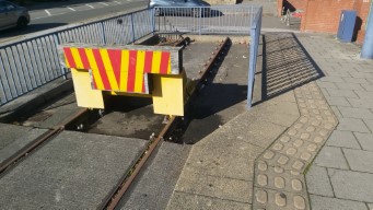 A shot of the buffer stop and overrun rail at Middlewood from the front.