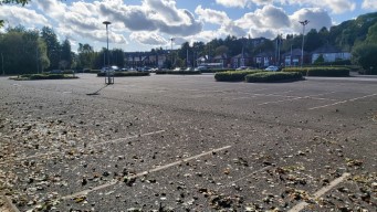 A wide shot showing all of the Middlewood park-and-ride car park, it is mostly empty.