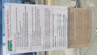 A flyer attached to a bus shelter, calling for better bus services. A second piece of paper
                explains how bus services are the responsibility of the Mayor of South Yorkshire, rather than
                Sheffield City Council.